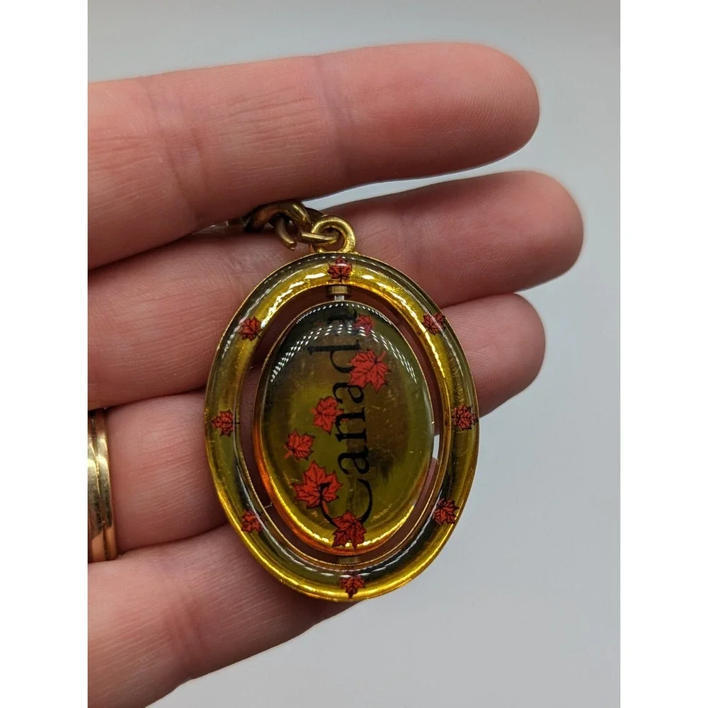 Vintage Canada Flippable Swivel Metal Enamel Keychain 4